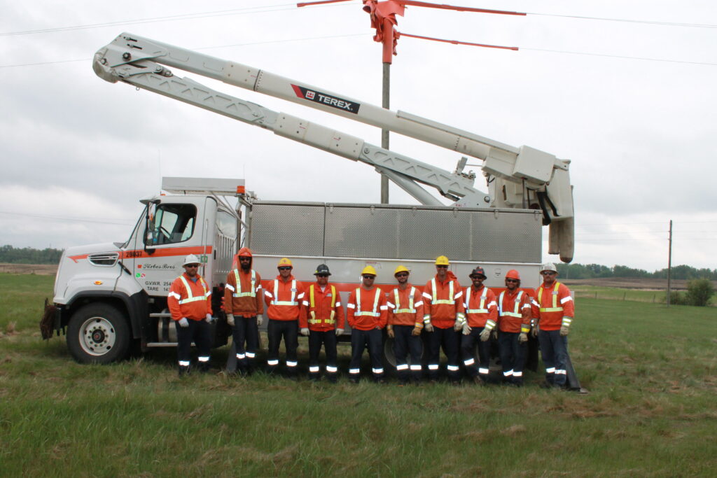 Forbes team members on a work site.