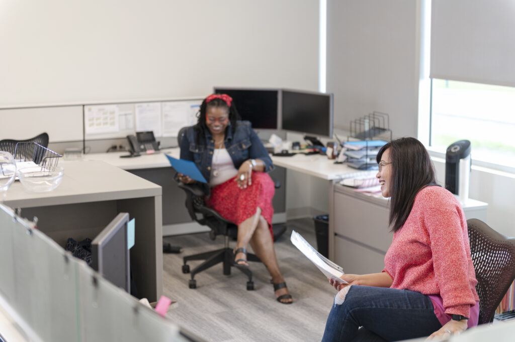 Forbes team members in an office.